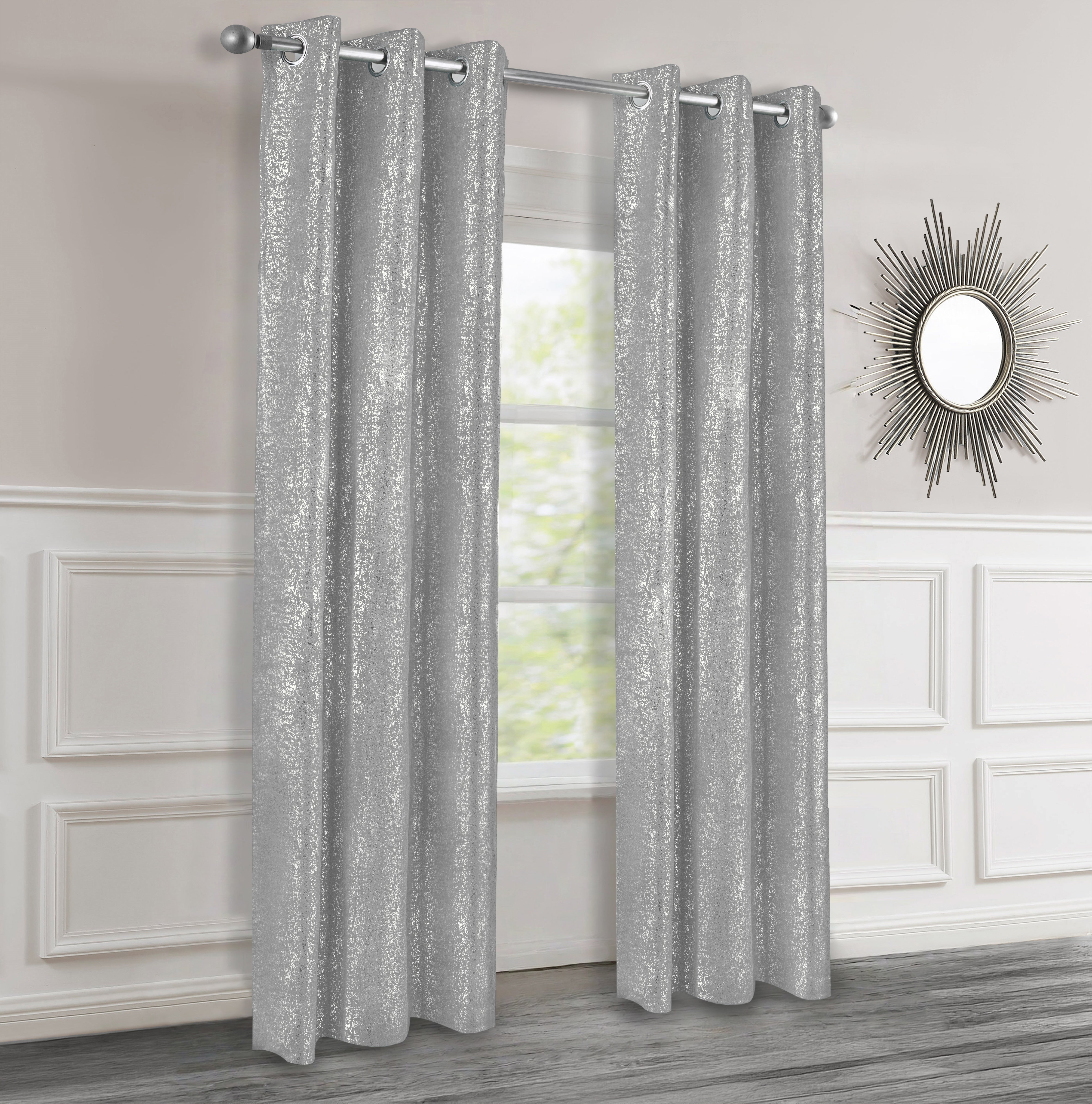 Silver textured curtains with silver lurex hanging in a room with a mirror on the wall.