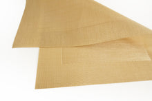 Load image into Gallery viewer, Dainty Home Santa Monica Woven Textilene Crossweave With Solid Geometric Pattern Reversible 13" x 19" Rectangular Placemats
